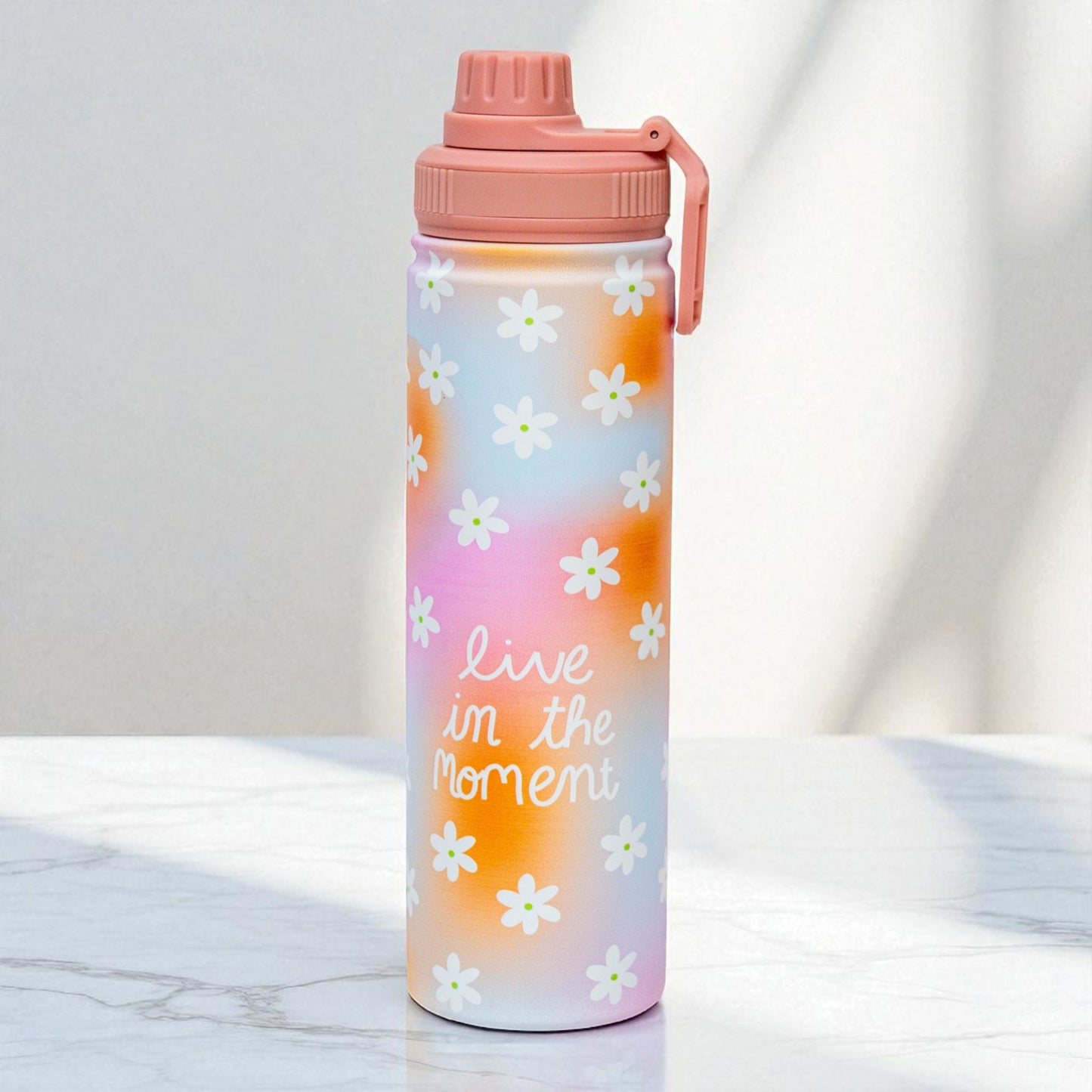 Stainless steel water bottle with a straw lid